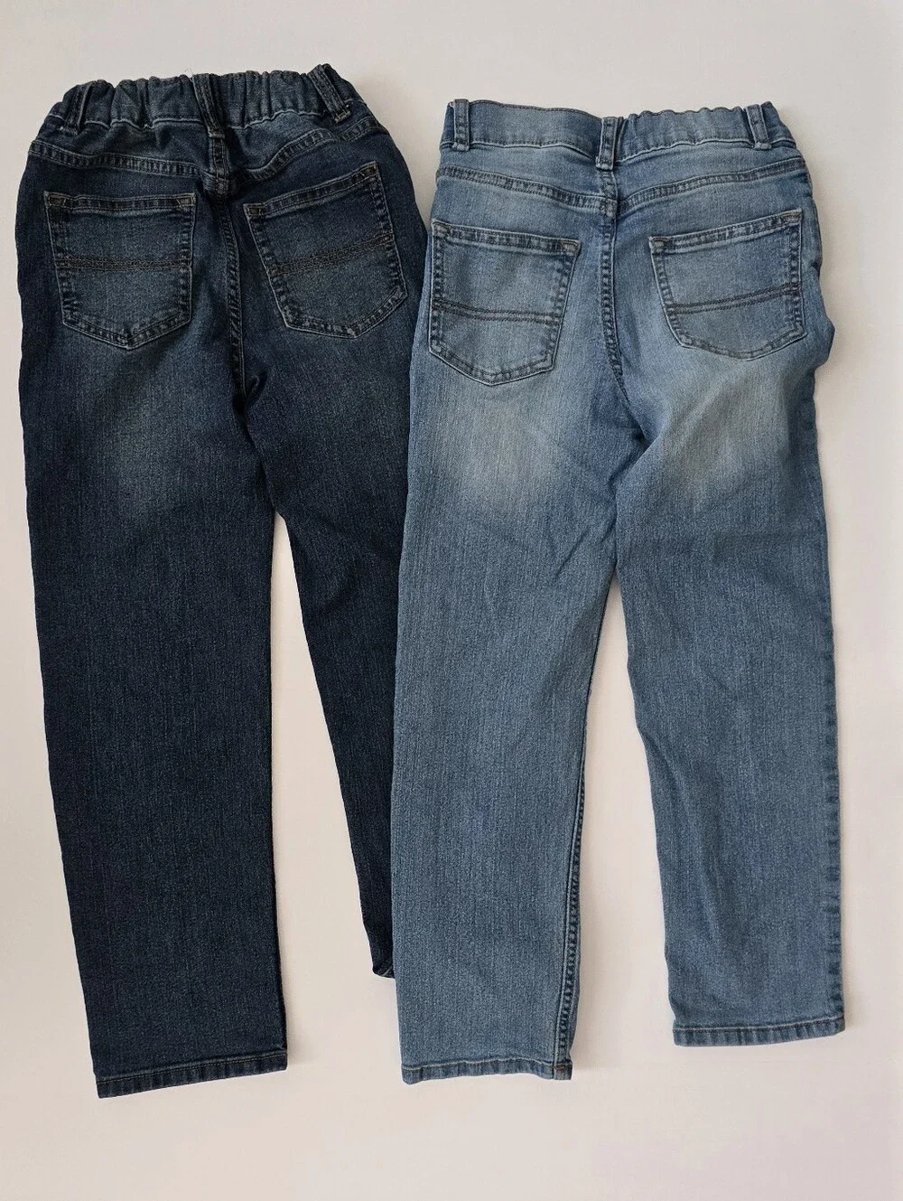 2 Pack. OshKosh B'gosh Kid's Straight Jeans in Light Blue and Dark Blue